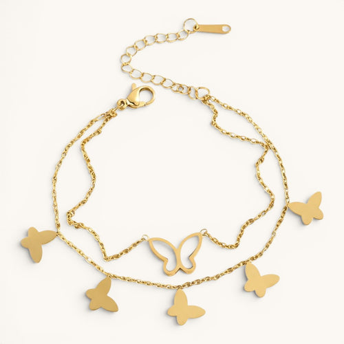 TITLIYA gold-toned layered chain bracelet featuring delicate butterfly charms and a white inlay butterfly detail.