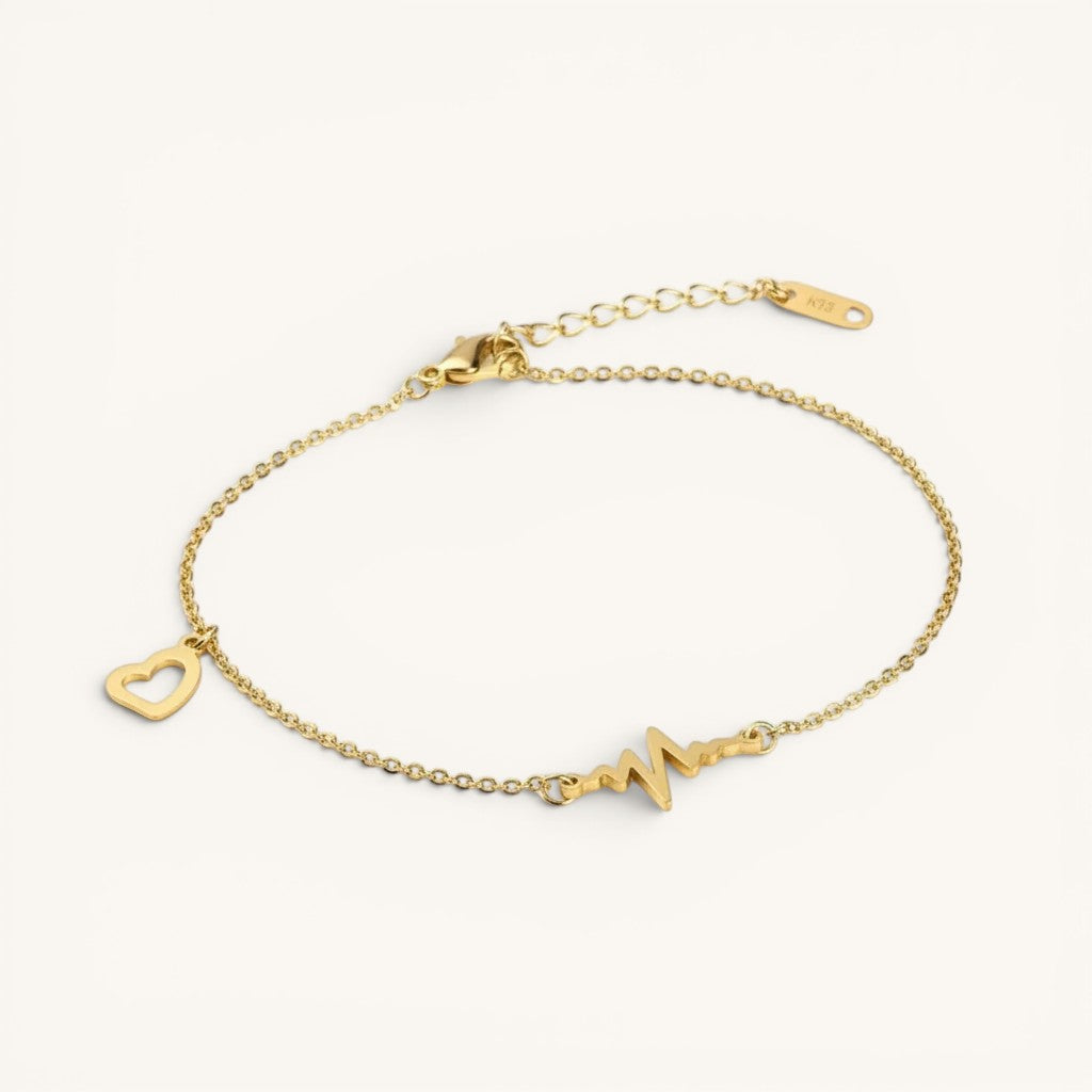 TITLIYA gold-tone adjustable 2-in-1 bracelet and anklet featuring a heartbeat motif and a delicate open-heart charm.
