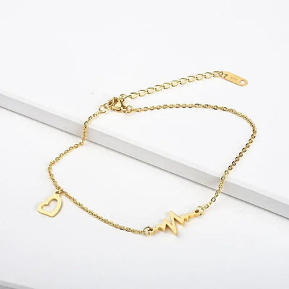 TITLIYA gold-tone 2-in-1 heartbeat and heart charm bracelet or anklet with adjustable chain and lobster clasp.
