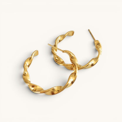TITLIYA medium gold twisted hoop earrings with a polished finish, perfect for daily wear or elegant gifting.