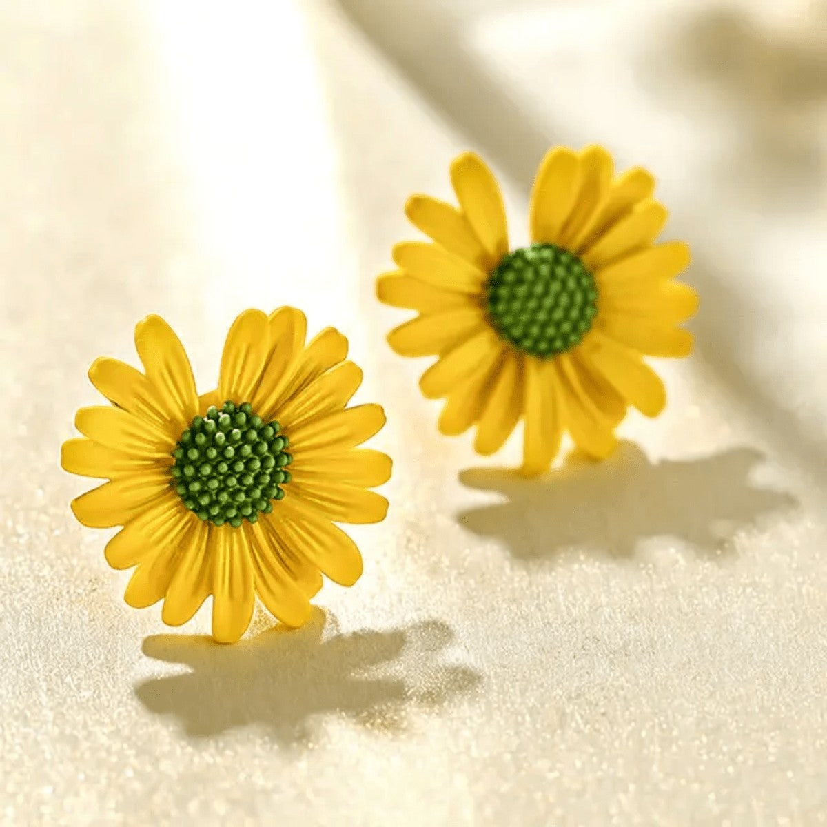TITLIYA mini flower Korean stud earrings featuring yellow daisy petals and a textured green center for daily wear.