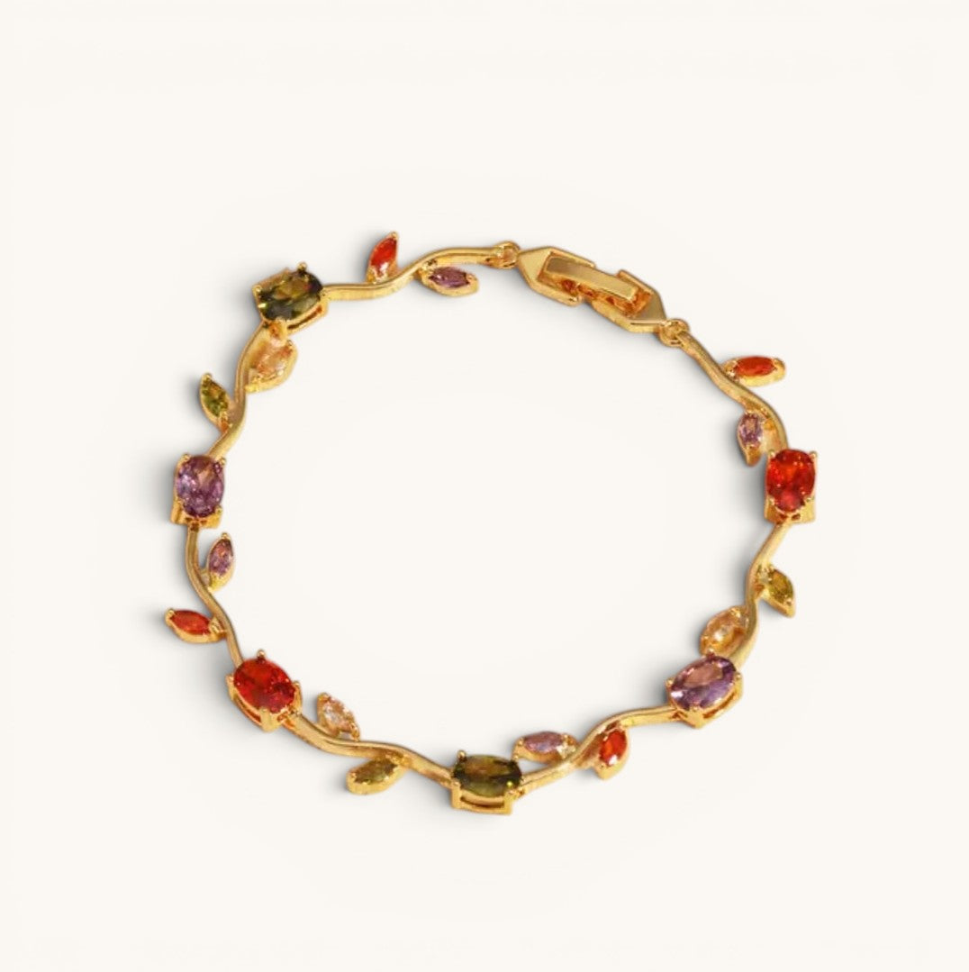 TITLIYA RGL Multicolour Tulip Bracelet featuring a gold-tone vine chain with vibrant crystal flower accents.