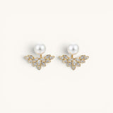 TITLIYA gold-tone pear leaf Korean stud earrings featuring white pearls and sparkling crystal accents.
