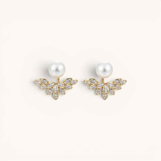TITLIYA gold-tone pear leaf Korean stud earrings featuring white pearls and sparkling crystal accents.