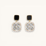 TITLIYA premium square earrings featuring black studs, clear crystals, and a delicate pearl border in gold-tone metal.