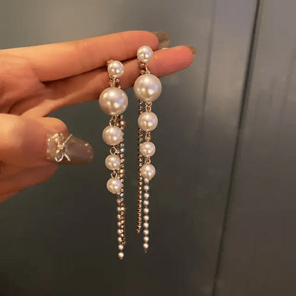 TITLIYA elegant Korean-style long drop earrings featuring multiple white pearls and sparkling crystal chains.