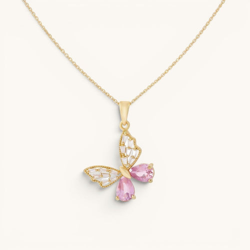 TITLIYA gold butterfly pendant necklace featuring pink teardrop crystals and clear baguette stones on a delicate chain.