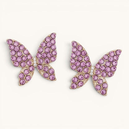 TITLIYA pink butterfly stud earrings with sparkling crystal embellishments on a gold-tone finish for daily wear.