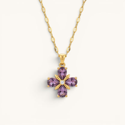 TITLIYA gold necklace featuring a purple stone flower pendant with four teardrop petals and a central diamond accent.