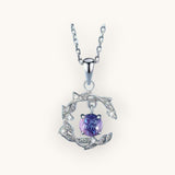 TITLIYA silver pendant necklace featuring a round purple stone set in a delicate leaf-inspired frame with crystals.