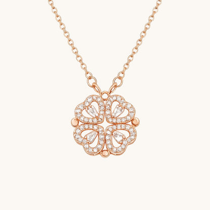 TITLIYA rose gold magnetic four-heart clover pendant necklace with sparkling crystal accents on a delicate chain.