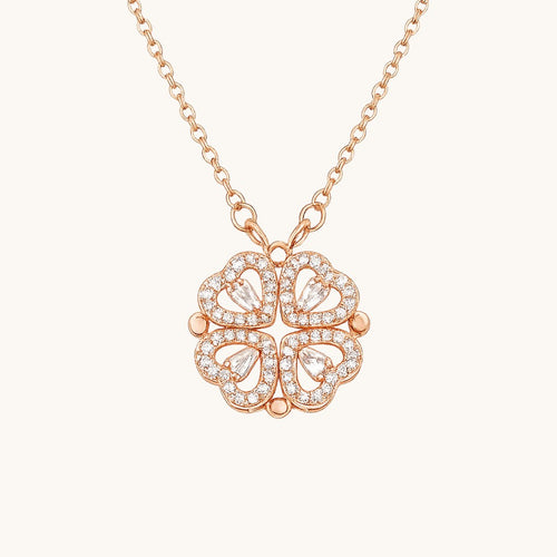 TITLIYA rose gold magnetic four-heart clover pendant necklace with sparkling crystal accents on a delicate chain.