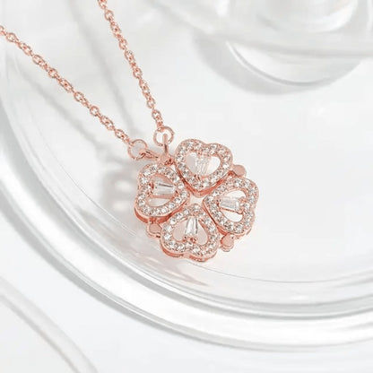 TITLIYA rose gold magnetic four-heart clover pendant necklace with sparkling crystals on a delicate chain.