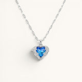 TITLIYA silver plated necklace featuring a blue heart-shaped stone pendant with delicate angel wing accents.