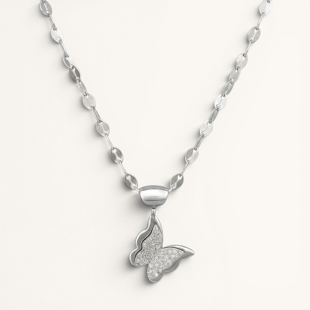 TITLIYA silver butterfly pendant necklace with a textured crystal-embellished wing design on a delicate chain.