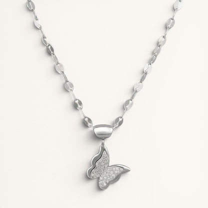 TITLIYA silver butterfly pendant necklace with a textured crystal-embellished wing design on a delicate chain.