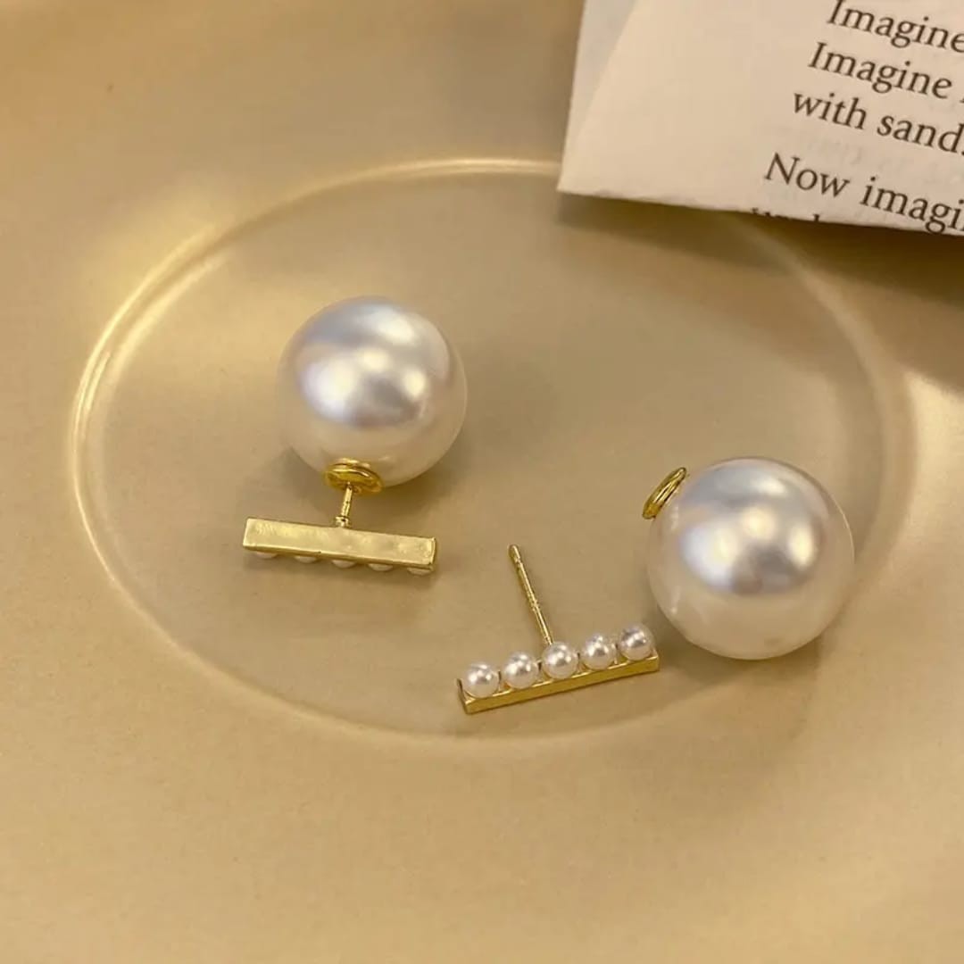 TITLIYA white pearl drop earrings featuring a gold-tone stick bar with small accent pearls for elegant daily wear.