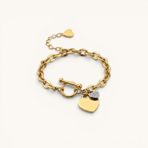 TITLIYA gold-tone chain bracelet with a toggle clasp and two heart charms, one polished and one crystal-encrusted.