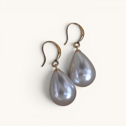 TITLIYA elegant teardrop white pearl earrings with gold-tone hooks for daily wear or special occasions.